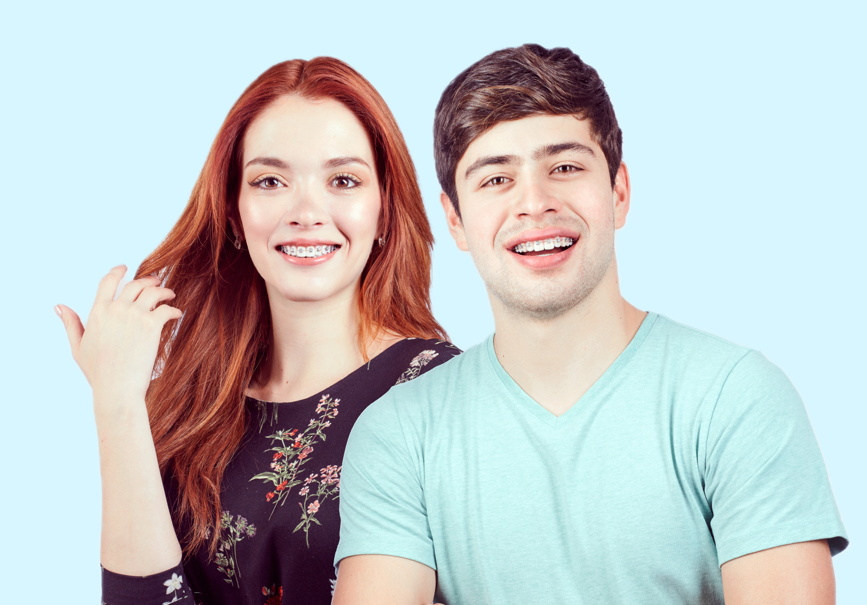 A Girl And Boy Teen Smiling Wearing Braces