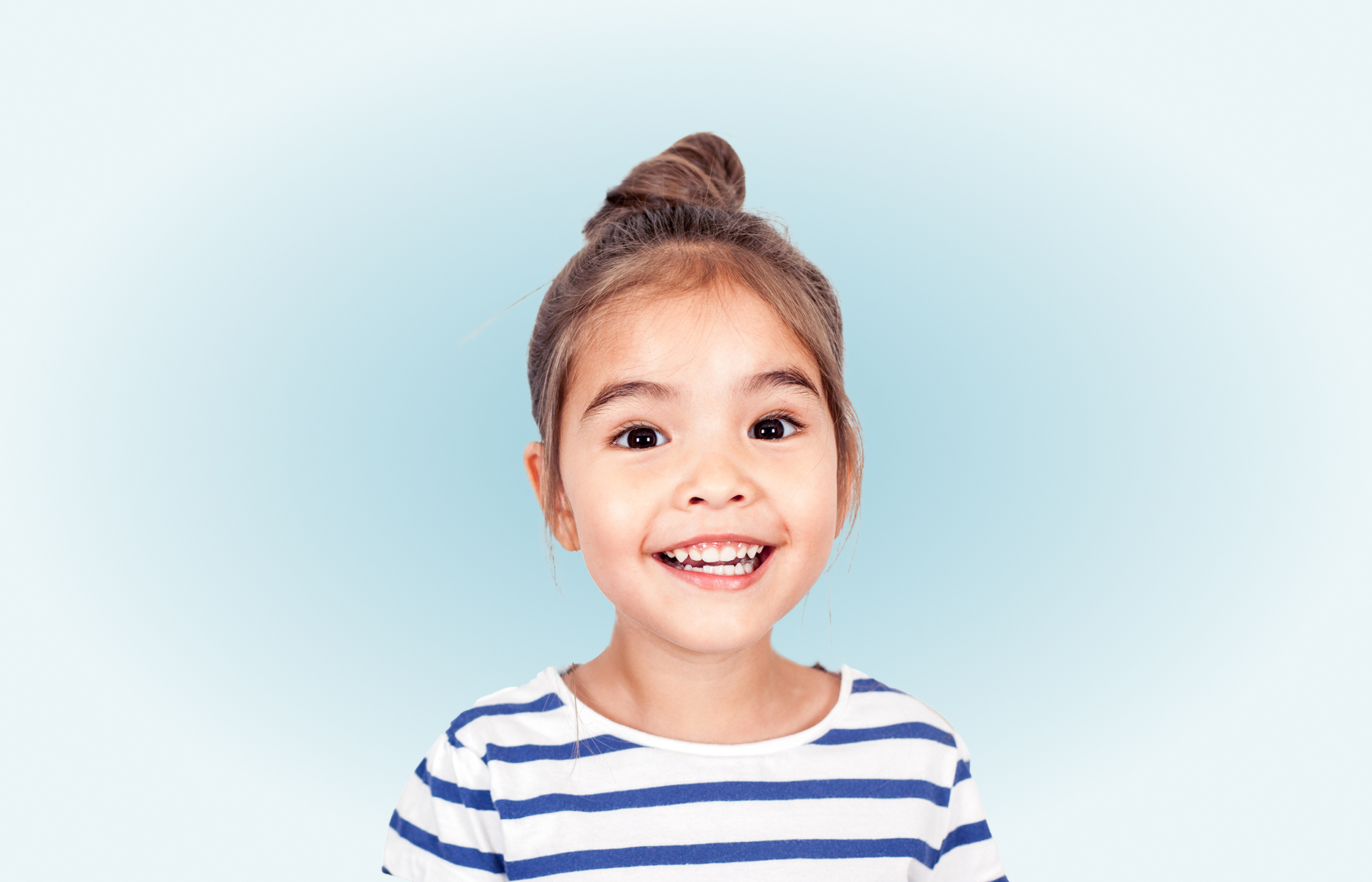 A Smiling Little Girl In A Blue Striped Shirt