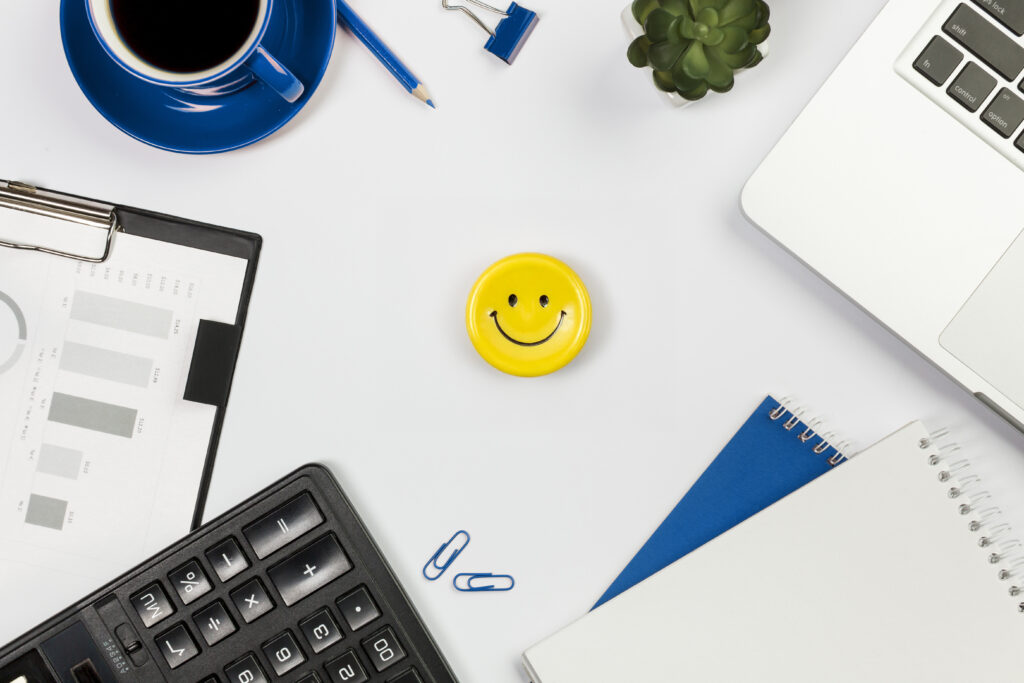 Calculator Laptop Spiral Notepad Coffee Cup Cactus Plant White Desk