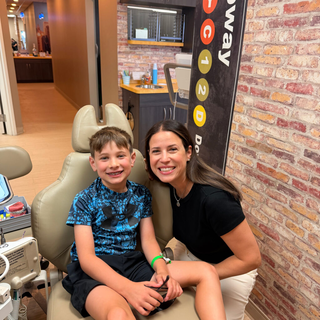 Smiling Happy Mother And Son Patient